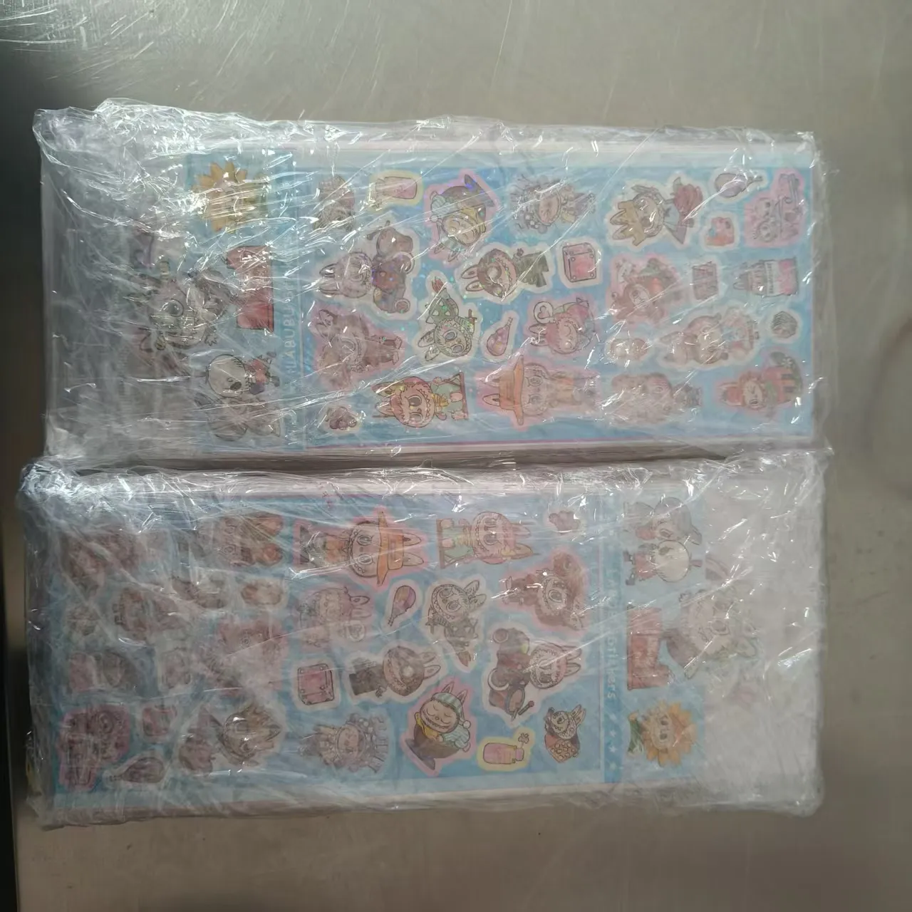 Perusahaan ngirim stiker bocah-bocah sing wis dipotong ing minggu kepungkur